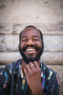 Man with a beard smiling